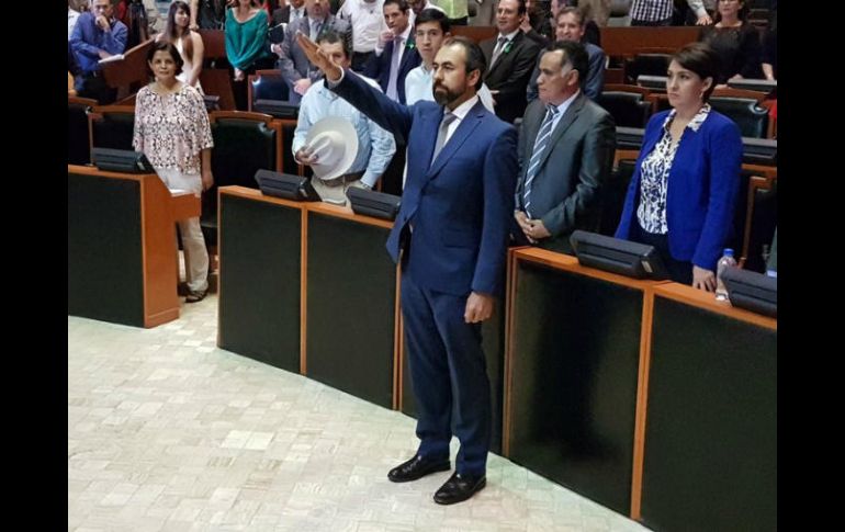 Juan Luis González Montiel, durante su toma de protesta como magistrado del TAE. TWITTER / @LegislativoJal
