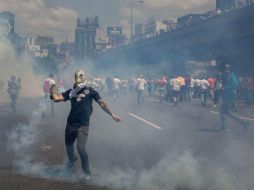 Un grupo de personas participan en una manifestación contra el gobierno venezolano en Caracas. EFE / M. Gutiérrez