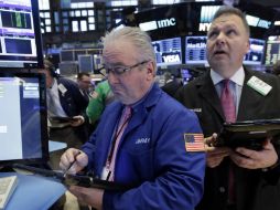 El Dow Jones, el NYSE Composite, el Standard & Poor's y el Nasdaq Composite registran una ligera caída este viernes. AP / ARCHIVO