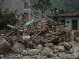 La cifra de heridos se mantiene en 332 y se han entregado 247 cuerpos a las familias. ESPECIAL / Xinhua