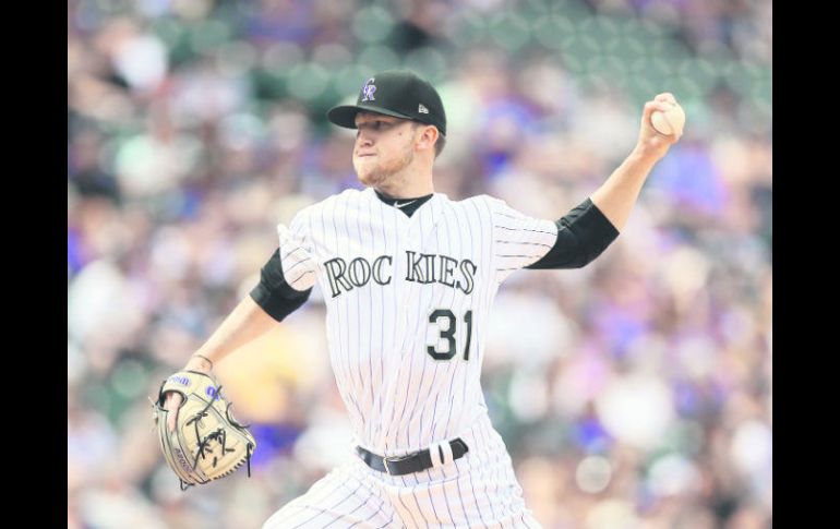 Kyle Freeland, vistiendo la franela de los Rockies, tuvo una buena actuación en la lomita en lo que fue su debut en Grandes Ligas. AFP / J. Edmonds