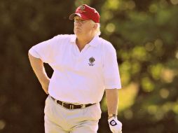 La Casa Blanca asegura que Trump utiliza sus salidas al campo de golf para convivir con quienes lo visitan. AP / ARCHIVO