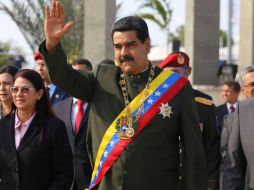 El mandatario iba vistiendo la banda y joyas presidenciales. AFP / Presidencia de Venezuela
