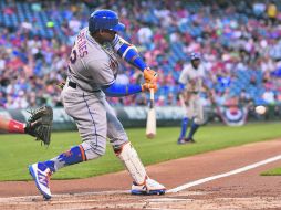 Desatado. En el primer inning, Yoenis Céspedes conectó un jonrón productor de tres carreras. AFP / D. Hallowell