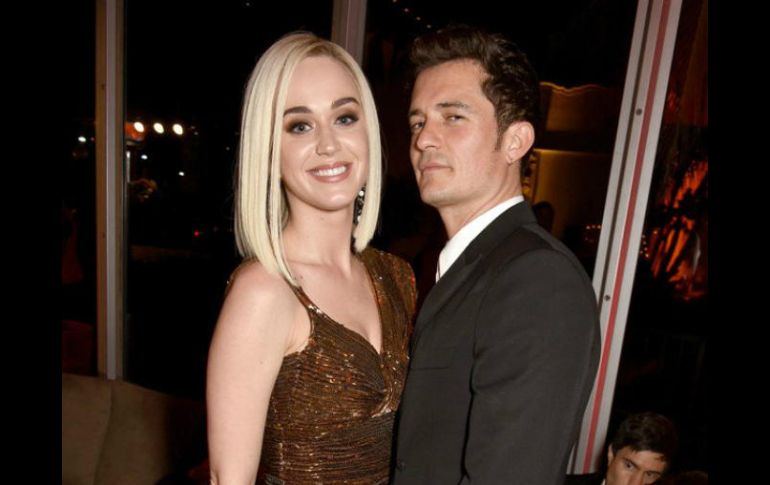 Bloom habló sobre las famosas fotografías que le tomó un paparazzi mientras remaba desnudo junto a Perry. ESPECIAL / http://la.eonline.com