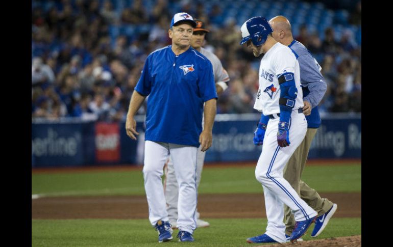 Además del mal resultado, los Azulejos también perdieron a Josh Donaldson (Der.), uno de sus mejores jugadores. AP / N. Denette