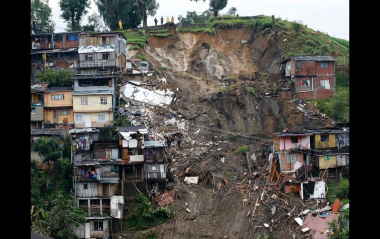 Vista general luego de los deslaves que afectaron hoy a ocho barrios de la ciudad de Manizales. AFP /