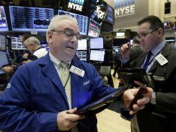 La jornada estuvo marcada por los malos resultados del grupo informático IBM. AP / R. Drew