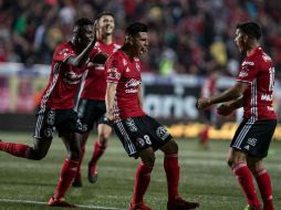 Joe Corona celebra la anotación que abrió el marcador. AFP / G. Arias