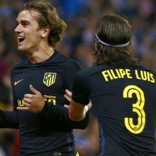 El Atlético gana al Espanyol y mantiene alejado al Sevilla