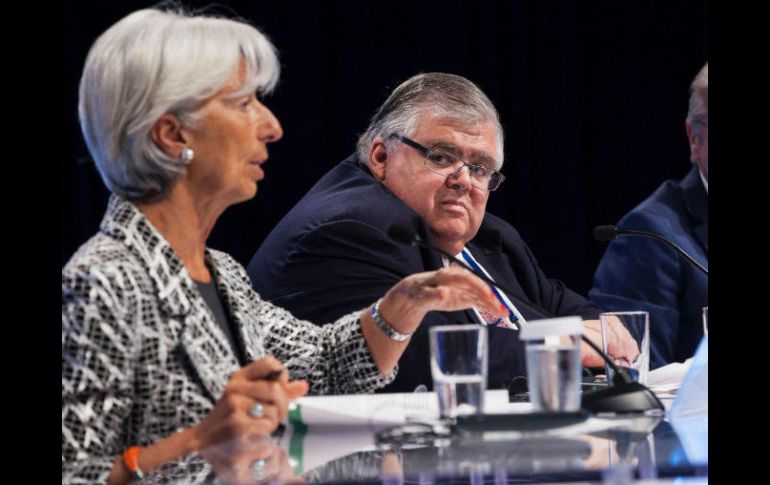 Carstens explicó que la palabra fue eliminada de diferentes secciones del comunicado. AFP / Z. Gibson