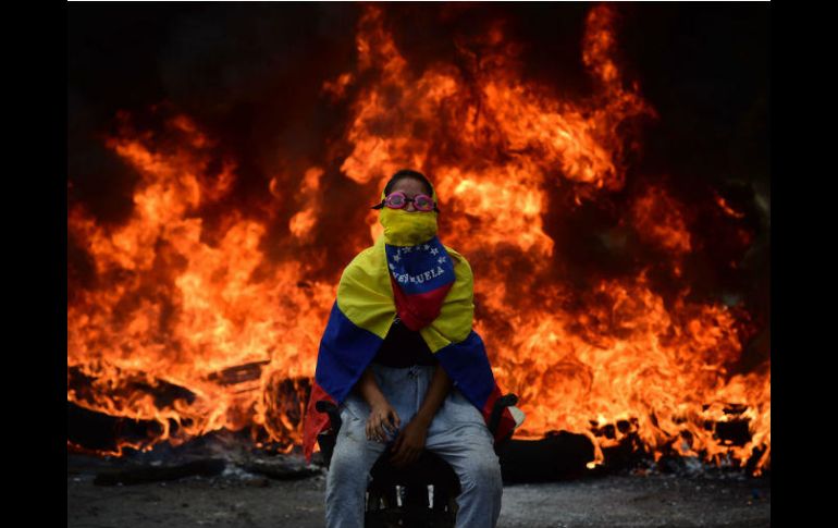 Las protestas organizadas por la oposición han dejado 30 muertos en Venezuela. AFP / R. Schmidt