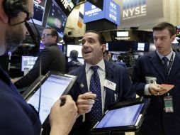 El Nasdaq se quedó a unas décimas de su tercer récord consecutivo. AP / R. Drew