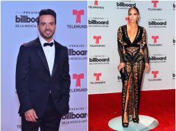 Jennifer López lució un vestido negro escarpado de innumerables transparencias y brillantes. ESPECIAL /