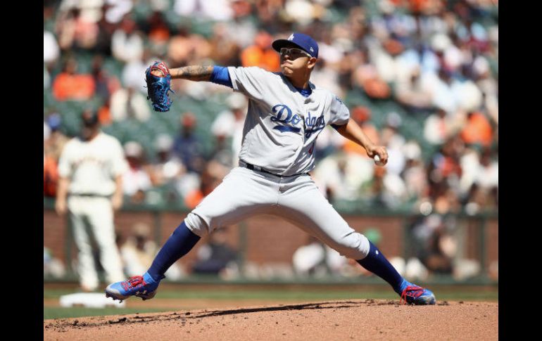 Julio Urías lanzó por espacio de cinco entradas y dos tercios permitiendo una carrera y cuatro hits. AFP / E. Shazw