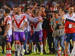 El equipo de Veracruz celebra su triunfo ante Rayados. MEXSPORT / L. Monroy
