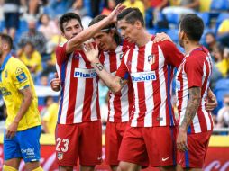 Los goles de los ''cochoneros'' son hechos por Kevin Gameiro, en dos ocasiones, Saúl Ñíguez, Thomas Partey y Fernando Torres (c). AFP / D. Martin