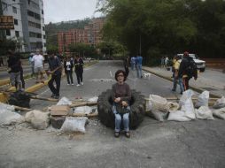 La oposición ha acusado a Maduro de utilizar a los poderes Judicial y Electoral para postergar las elecciones y evitar su derrota. AP / F. Llano