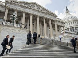 La ley dejó fuera recursos solicitados para el muro fronterizo y la contratación de agentes para la fuerza de deportación. AP / ARCHIVO