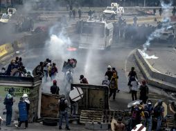Los  manifestantes fueron dispersados con gases y perdigones de goma por la Guardia Nacional Bolivariana. AFP / J. Barreto