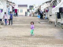 Oncüpinar. Los sirios conviven de cerca, debido a los pequeños espacios que les proporcionan para vivir, aún así, son afortunados. EFE /