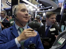 El Dow Jones reportó un retroceso de 34.65 puntos, por otro lado, el Nasdaq ganó 8.56 unidades. AP / R. Drew
