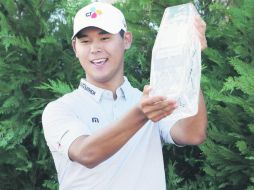 Vencedor. Si Woo Kim tuvo un buen cierre para coronarse en el torneo The Players. AP /