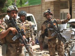 Antes de ser cercados por los agentes, los extremistas mataron a un hombre. AFP / A. Al-Rubaye