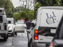 Personal forense atiende un reporte en Guadalajara. EL INFORMADOR / Archivo