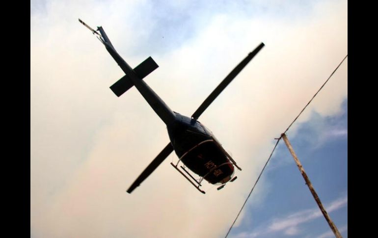 Dos helicópteros fueron utilizados para apoyar las labores de combate al incendio. ESPECIAL / Gobierno de Zapopan