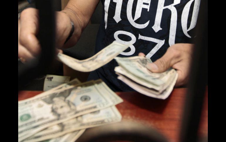 El Banxico fijó en 18.6633 pesos el tipo de cambio para obligaciones denominadas en moneda extranjera. EL INFORMADOR / ARCHIVO