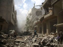 Otro bombardeo se produjo en la provincia de Deir al Zur, fronteriza con Iraq, donde 11 personas de dos familias murieron. AFP / ARCHIVO