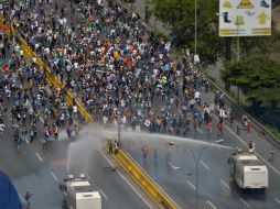 Las manifestaciones opositoras en Venezuela han dejado, hasta el momento, más de 50 muertos. AFP / L. Robayo