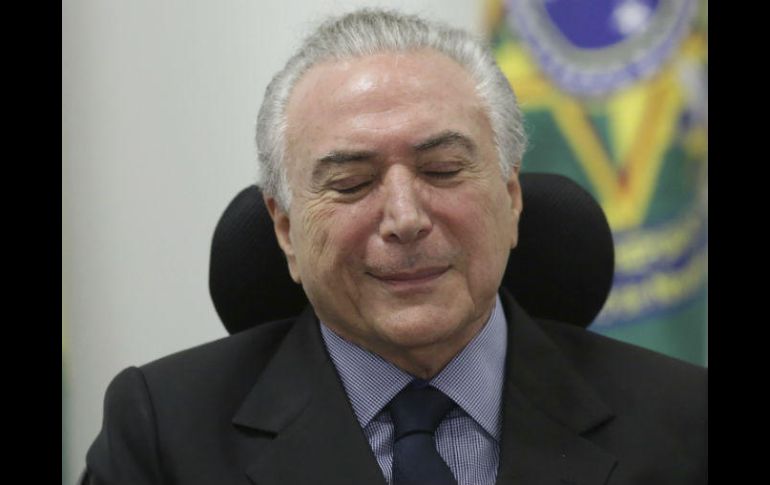 Los abogados de Temer alegan que no puede prestar testimonio mientras no se determine si la grabación que salió a la luz es legítima. AP / E. Peres