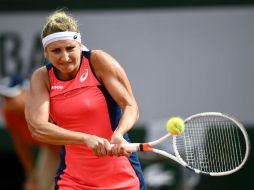Con la victoria de Bacsinszky y la eliminación de Muguruza el Grand Slam de París tendrá nueva campeona. AFP / C. Simon
