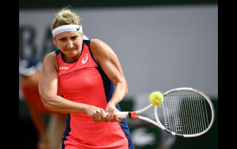 Con la victoria de Bacsinszky y la eliminación de Muguruza el Grand Slam de París tendrá nueva campeona. AFP / C. Simon