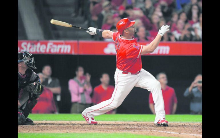 Alber Pujols se convirtió en el primer jugador en conseguir su jonrón 600 con un grand slam, el sábado pasado ante los Mellizos. AP /