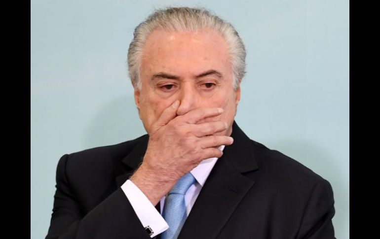 Temer afronta un juicio en el cual se determinará si la campaña de 2014 se financió irregularmente. AFP / E. Sa