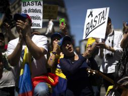 Los manifestantes se congregaron en la plaza de Callao con lemas como ''Basta de dictadura, de represión, de víctimas''. AP / F. Seco