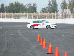 Emoción. Autos último modelo rodaron por el asfalto del Trióvalo Internacional de Cajititlán. EL INFORMADOR / M. Vargas