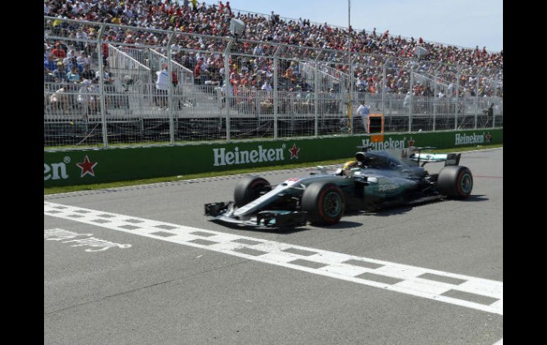 El piloto de Mercedes suma su sexta corona en el circuito de Canadá. AP / P. Chiasson