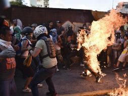 La oposición continuó este jueves las manifestaciones en varias ciudades de Venezuela. AFP / C. Becerra