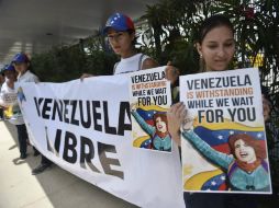 La Comunidad del Caribe (Caricom) llama al diálogo y a evitar la violencia en su propuesta, entre otros. AFP / P. Pardo