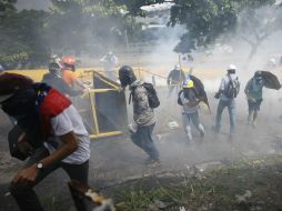 Los opositores mencionan que mientras se desarrollaba la sesión, en su país estaban siendo asesinados dos jóvenes. AP / A. Cubillos