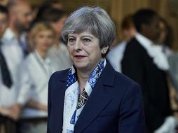 May fue muy criticada por evitar a los afectados cuando visitó la zona del desastre, a la mañana siguiente. AFP / ARCHIVO