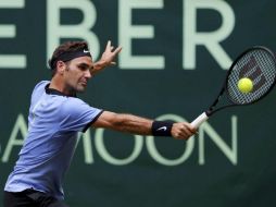 Federer consuma la victoria en una hora y 30 minutos. EFE / T. Larkin