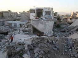 Desde el pasado 22 de mayo han muerto por lo menos 231 civiles en bombardeos efectuados en Al Mayadín. AP / A. Almohibany