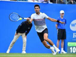 Es la primera vez que Nole acude a un evento en cancha de césped entre Roland Garros y Wimbledon desde 2010. AFP / G. Kirk