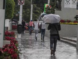 Recomiendan a la población mantenerse alerta ante posibles inundaciones y extremar precauciones al salir. EL INFORMADOR / ARCHIVO