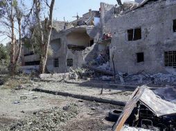 Imagen distribuida por la agencia SANA que muestra varios edificios dañados por la explosión. AP / SANA